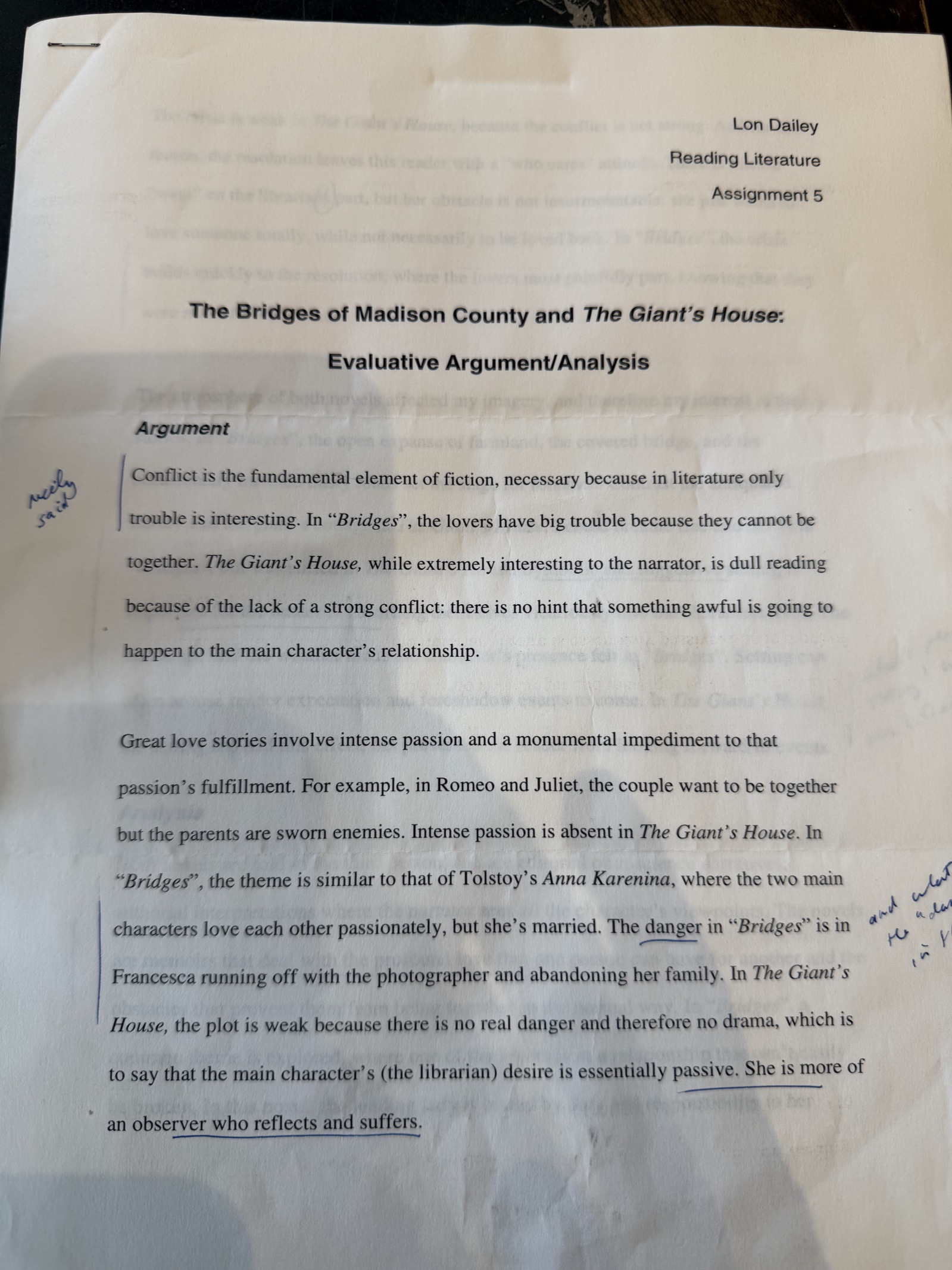 Page 1 of the essay, with the instructor's marks