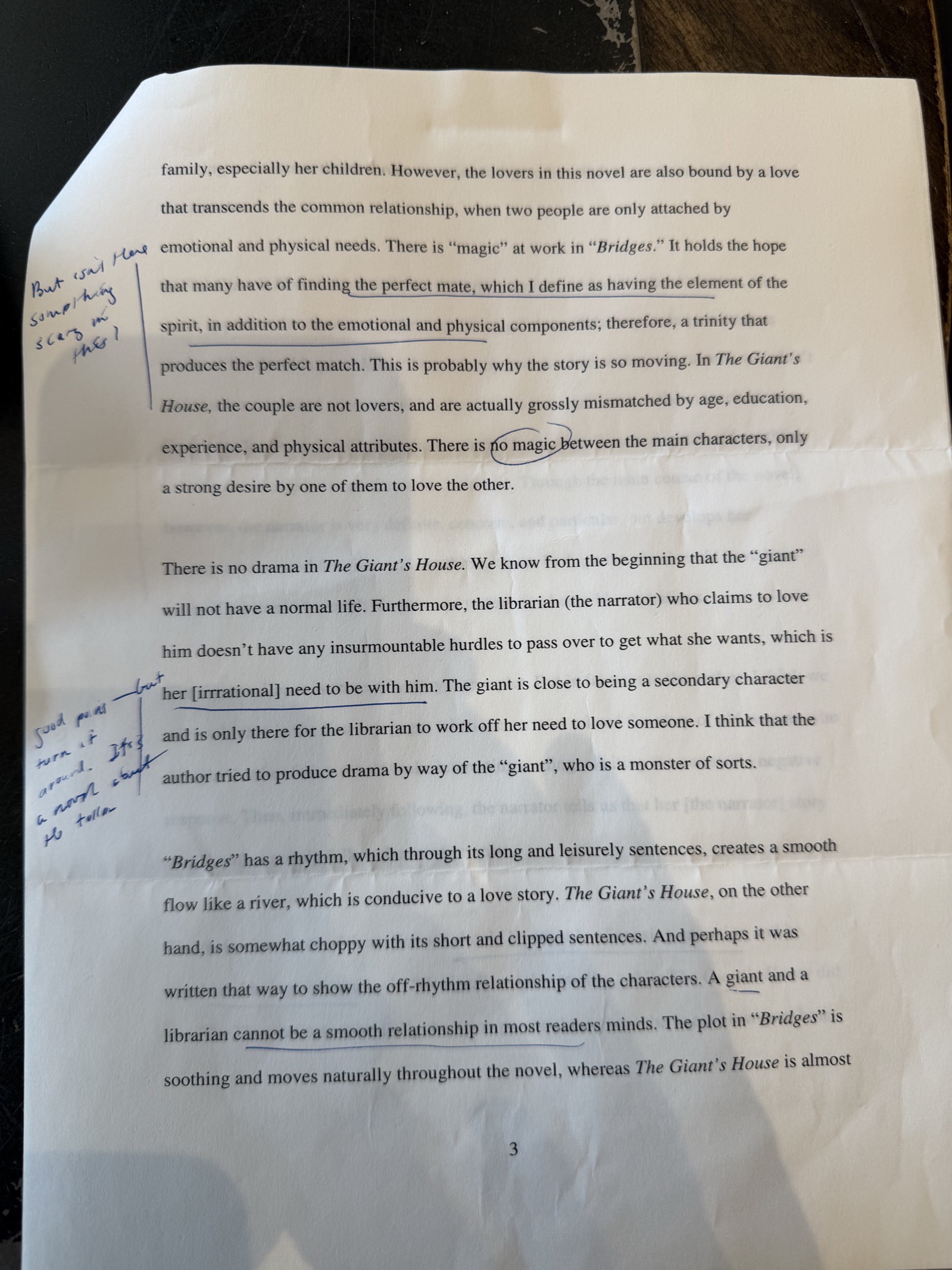 Page 3 of the essay, with the instructor's marks